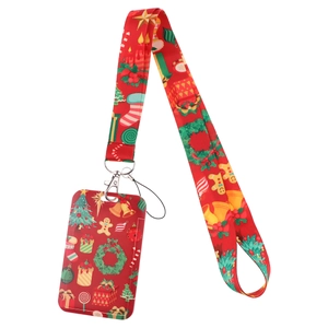 Close-up of Christmas themed red lanyard with festive gingerbread man and ID badge holder