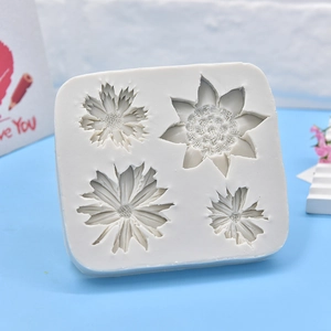 Daisy and sunflower silicone mold with four floral cavities for DIY soaps and candles