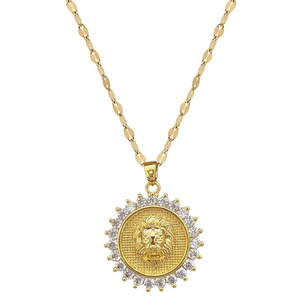 Elegant gold lion head pendant necklace with sparkling cubic zirconia on a dainty chain
