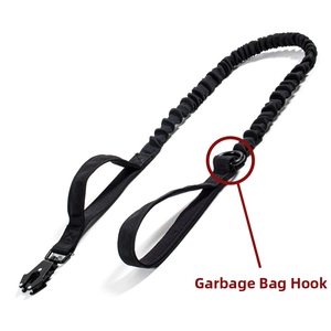 Tactical black dog leash with dual handles, elastic cord, and poop bag hook detail