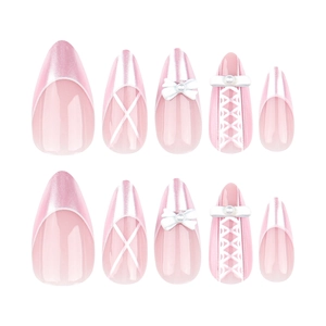 Pink French almond press-on nails with 3D bows, pearls and ribbon corset designs