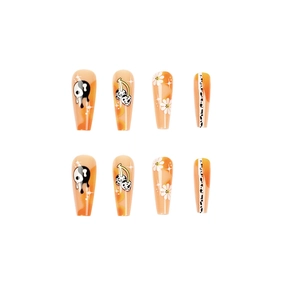 Faux ongles cercueil orange avec motifs yin yang, cerises, marguerites et lignes