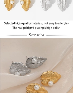 Détails des boucles d'oreilles perles en forme de feuille sur tissu de soie luxueux