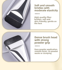 Macro detail of soft flat head foundation brush with dense fiber bristles and silver handle