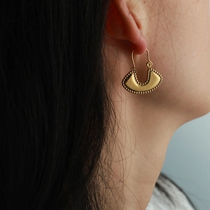 French design gold-plated titanium steel hoop earrings with a unique beaded edge for women