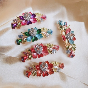 Vintage metal flower hair clips with rhinestones and enamel 5-piece set on satin