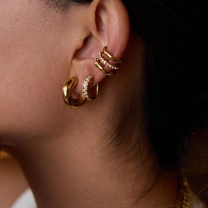 Gold stainless steel ear cuff and hoop earring set featuring sparkling zircon stones