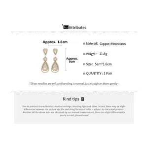 Detailed size specifications of gold-plated copper teardrop earrings with crystals