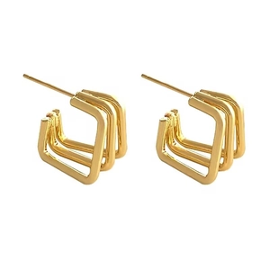 Modern gold-tone triple layered square hoop earrings with minimalist geometric design