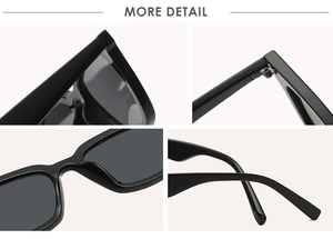 Macro view of black cat-eye sunglasses featuring metal hinges and ergonomic nose pads