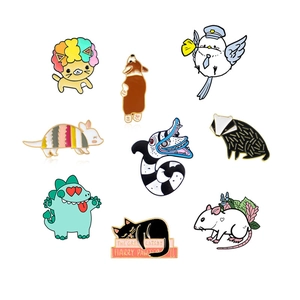 Set of 9 colorful enamel animal pins featuring cute cats, dinosaurs and corgi badges