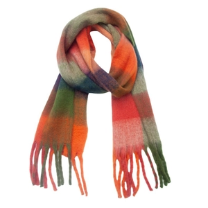 Detail of colorful plaid chunky scarf showing soft texture and twisted fringe tassels