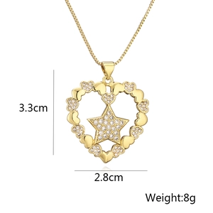 Detailed view of gold plated heart pendant with zircon star and 3.3cm size specs