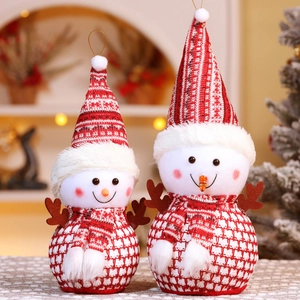 Detailed view of red and white knitted snowmen with 3D carrot noses and plush antlers