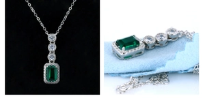 Detail view of emerald pendant with square green gem and round zircon in S925 silver