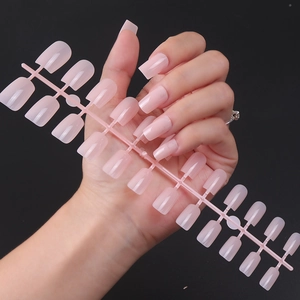 Detailed view of long square pink translucent jelly press-on nails in various sizes