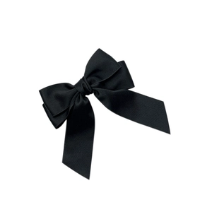 Elegant black satin double bow hair clip with long ribbons on a white background