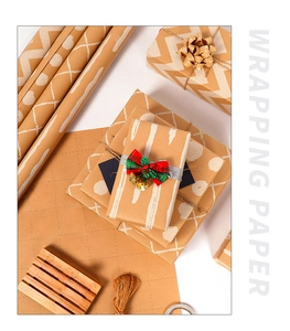 Brown kraft wrapping paper rolls with white geometric patterns and natural hemp rope ties