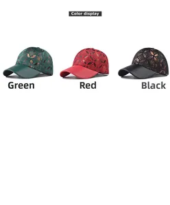Three thick plaid baseball caps in green, red and black with geometric hollow mesh details