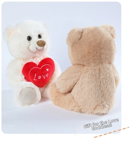 Close-up of white and brown plush teddy bears with embroidered Love heart detail