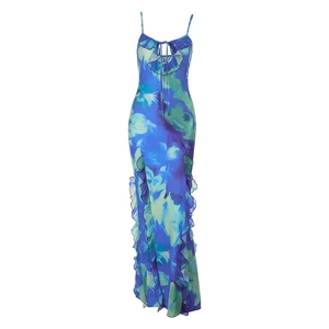 Dettaglio dell'abito halter floreale blu e verde con orlo a balze e design aderente