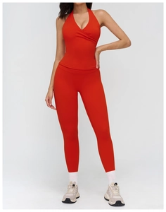 Front view of a red V-neck halter yoga vest and high-waisted leggings set for women