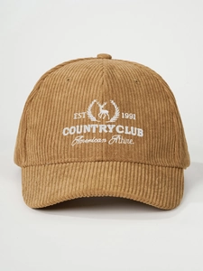 Detailed close-up of EST 1991 elk embroidery on khaki corduroy vintage baseball cap