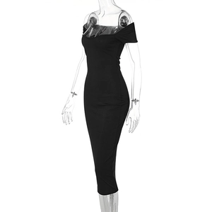 Close-up of black ribbed knit texture on slim fit off-shoulder midi dress