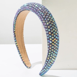 Detail of sponge padded headband featuring iridescent purple rhinestones and star patterns