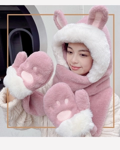 Detail of pink and white plush 3-in-1 winter hood scarf with cute cat paw and bunny ears