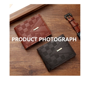 Detailed close-up of brown and dark coffee bi-fold wallets with check pattern on wood