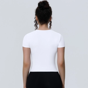 Back view of a white slim fit yoga t-shirt showing the sleek breathable fabric and cut