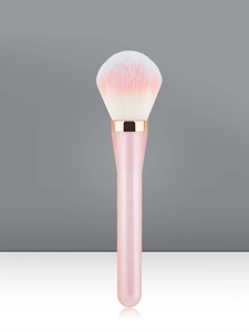 Detailed view of the gradient soft bristles and rose gold ferrule of a makeup brush