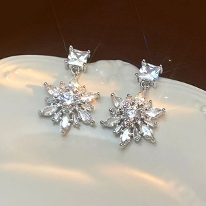 Exquisite 14k gold plated snowflake drop earrings with sparkling zircon gemstones