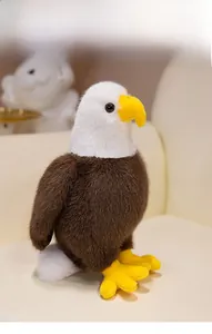 Close-up of bald eagle plush toy showing realistic brown and white faux fur texture
