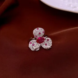 French palace style flower ring featuring red crystal and micro-paved zircon petals