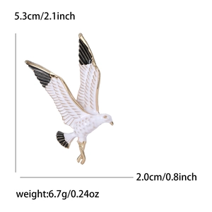 Enamel hummingbird seagull brooch in white and gold alloy for women's suits