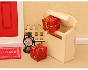 Miniature wooden mailbox with tiny red gift boxes and a retro lantern festive scene