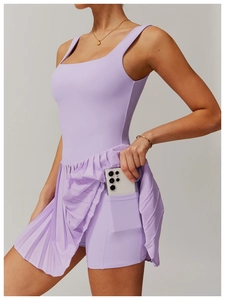 Detail view of the side pocket on pleated tennis dress shorts for large smartphones