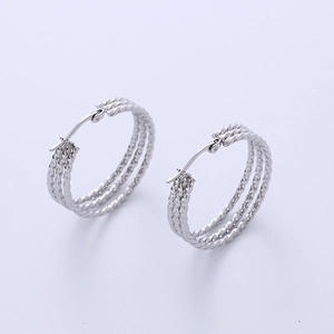 Silver twisted rope hoop earrings with minimalist braided metal design for women