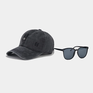 Retro charcoal grey washed baseball cap with decorative leather strap and metal buckle