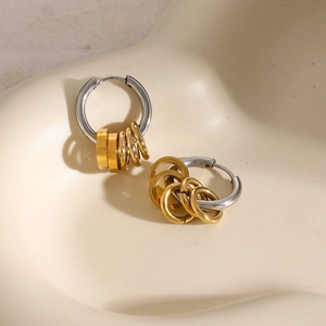 Chic two-tone stainless steel hoop earrings with gold-toned ring charms for women