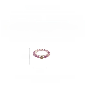 Detail of 6mm purple amethyst beads and copper accents on a 17cm beaded bracelet