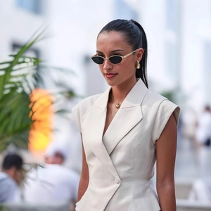 Women's chic beige sleeveless blazer top and wide-leg pants two-piece street style set