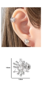 Detail of snowflake ear stud with zircon and pearl accents, size 1.0cm by 1.0cm