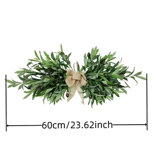 Detail view showing 60cm long artificial olive leaf door swag with burlap bow decoration