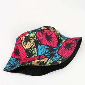 Detail of colorful geometric fisherman hat with black palm tree tropical pattern print