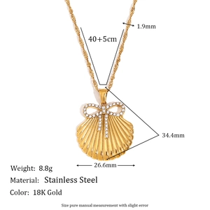 18K gold plated stainless steel necklace featuring a shell pendant with crystal bow