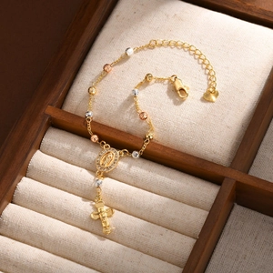 Bracelet chapelet bicolore avec médaille de la Vierge Marie et pendentif crucifix