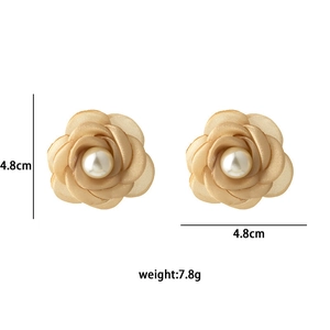 Detail shot of champagne gold lace flower earrings with pearl and dimensions 4.8cm x 4.8cm